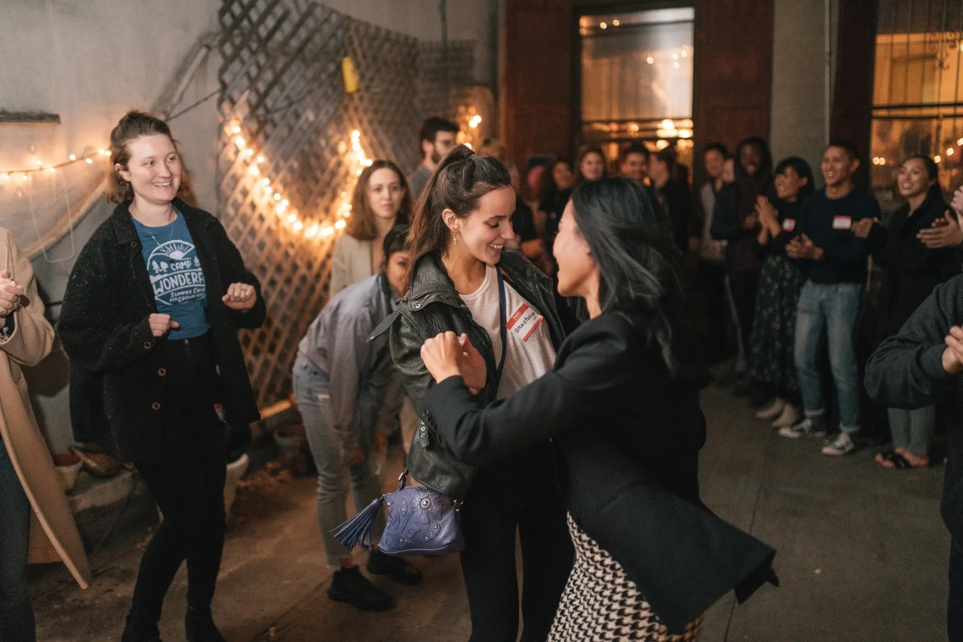 Thao Tran with guests at a Ditox Pink Moon community event
